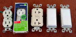 lot 55 image: ASSORTMENT OF WALL OUTLETS AND SWITCHES WITH A GFI