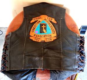 lot 71 image: FIRST GENUINE LEATHER (SZ 46) RIDING VEST WITH LEATHER PATCHES AND PINS