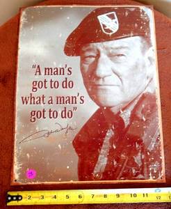 lot 73 image: JOHN WAYNE THEMED TIN SIGN - GREEN BERETS