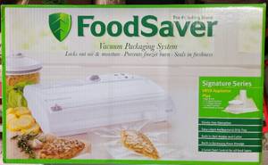 lot 32 image: FOODSAVER SIGNATURE SERIES V850 VACUUM SEAL SYSTEM IN UNOPENED BOX AS SHOWN.