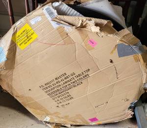 lot 55 image: LOT OF 2 REVERSIBLE LAMINATE TABLE TOPS IN MAHOGANYBLACK COLORS IN BOX AS SHOWN. (YOUR BID X 2)