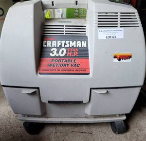 lot 63 image: CRAFTSMAN PORTABLE WETDRY VAC MODEL 113.177571 AS SHOWN.