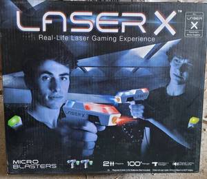 lot 99 image: LASER X 2 PLAYER LASER GAMING EXPERIENCE SET #1214162 IN BOX AS SHOWN.