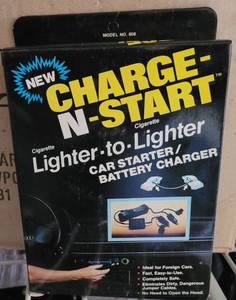lot 115 image: LOT OF 12 CHARGE-N-START LIGHTER TO LIGHTER CAR STARTERBATTERY CHARGER MODEL 808 IN BOXES AS SHOWN. (YOUR BID X 12)