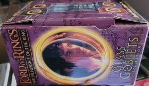 lot 124 image: LORD OF THE RINGS GLASS CHARACTER GOBLET IN BOX AS SHOWN.