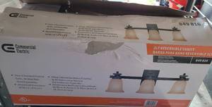 lot 135 image: 3 LIGHT REVERSIBLE VANITY FIXTURE 849816 IN BOX AS SHOWN.