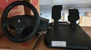 lot 158 image: THRUSTMASTER PLAYSTATION T80 RACING WHEEL AND PEDALS AS SHOWN.