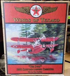 lot 166 image: ERTL COLLECTIBLES WINGS OF TEXACO THE DUKE 1936 KEYSTONE-LOENING COMMUTGER DIE CAST METAL BANK IN ORIGINAL BOX AS SHOWN.