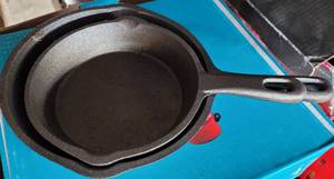 lot 215 image: LOT OF 2 CAST IRON SKILLETS AS SHOWN. (YOUR BID X 2)