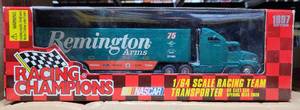 lot 243 image: 1997 RACING CHAMPIONS 164 SCALE DIE CAST RACING TEAM TRANSPORTER IN PACKAGE AS SHOWN.