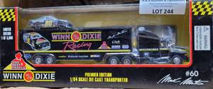 lot 244 image: LIMITED EDITION WINN DIXIE PREMIER EDITION 164 SCALE DIE CAST TRANSPORTER IN BOX AS SHOWN.