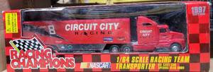lot 247 image: 1997 RACING CHAMPIONS 164 SCALE DIE CAST RACING TEAM TRANSPORTER IN PACKAGE AS SHOWN.