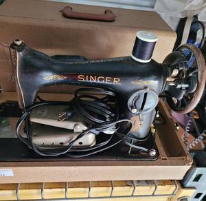 lot 322 image: VINTAGE SINGER PORTABLE SEWING MACHINE WITH STORAGECARRYING CASE AS SHOWN.