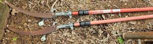lot 354 image: LOT OF 2 TELESCOPING PRUNING SAWS AS SHOWN.