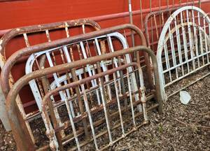 lot 355 image: LOT OF VINTAGE IRON BED FRAMES  SECTIONS AS SHOWN.