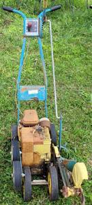 lot 386 image: JOHN DEERE EDGER TYPE M003G AS SHOWN.