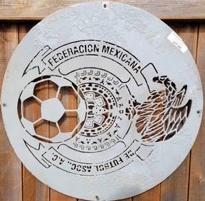 lot 390 image: METAL WALL DECOR DEPICTING THE MEXICAN FUTBOL FEDERATION LOGO AS SHOWN.