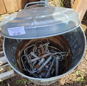 lot 420 image: GALVANIZED METAL TRASHCAN WITH ASSORTED PINS AS SHOWN.
