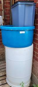 lot 439 image: 55 GALLON TANK PLUS TRASHCANS AS SHOWN.