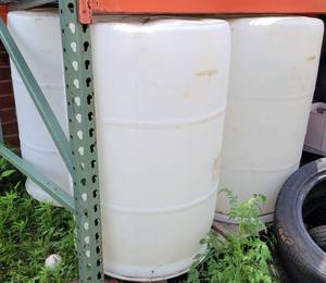 lot 447 image: LOT OF 4 PLASTIC 55 GALLON DRUMS AS SHOWN. (YOUR BID X 4)