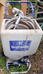 lot 479 image: GRACO TEXFINISH 1500 AIR-POWERED TEXTURE SPRAYER WITH TRIGGER GUN AS SHOWN.