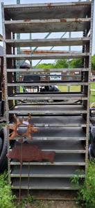 lot 487 image: METAL SHELF AS SHOWN.