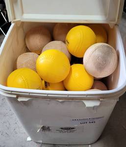 lot 545 image: BUCKET OF SOFT BASEBALLS FOR PITCHING MACHINES AS SHOWN.