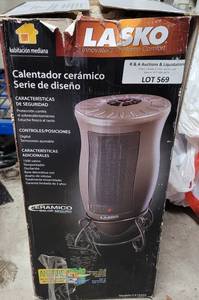 lot 569 image: LASKO DESIGN SERIES OSCILLATING CERAMIC HEATER IN BOX AS SHOWN.