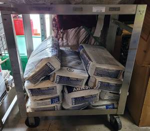 lot 590 image: STAINLESS STEEL CART WITH CASTERS AS SHOWN. CONTENTS NOT INCLUDED. DELAYED PICK UP -- SATURDAY AFTER 400 PM OR SUNDAY