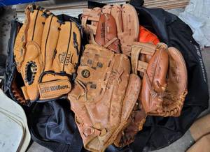 lot 610 image: LARGE SPORTS DUFFEL BAG WITH BASEBALL GLOVES, BASES AND MORE AS SHOWN.