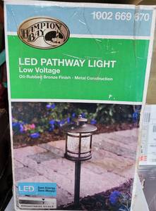 lot 648 image: HAMPTON BAY LED PATHWAY LIGHT 1002 669 670 IN BOX AS SHOWN.