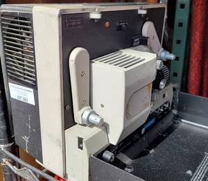 lot 661 image: VINTAGE FILMOSONIC MOVIE REEL PROJECTOR AS SHOWN.