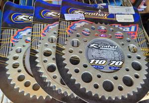 lot 706 image: LOT OF 3 NEW UNOPENED RENTHAL CHAINWHEELS FOR MOTORCYCLES AS SHOWN. (YOUR BID X 3)
