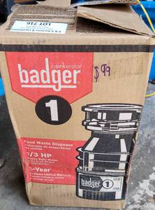 lot 716 image: INSINKERATOR BADGER FOOD WASTE DISPOSER IN BOX AS SHOWN.