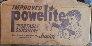 lot 779 image: IMPROVED POWELITE PORTABLE SUNSHINE JUNIOR MODEL 20 BY POWELL PRODUCTS IN BOX AS SHOWN. COPYRIGHT 1950.