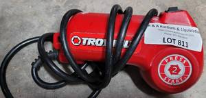 lot 811 image: TROYBILT CORDED TRIMMER JUMP STARTER MODEL 49M2027P966 AS SHOWN.