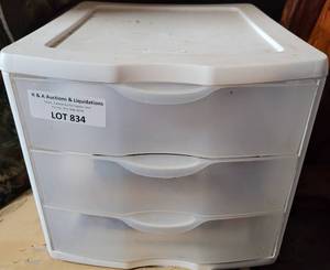 lot 834 image: SMALL 3-DRAWER PLASTIC STORAGE WITH CONTENTS AS SHOWN.