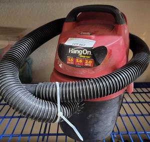 lot 867 image: HANG ON BY SHOP VAC 1.5 GALLON VACUUM MODEL J150A AS SHOWN.