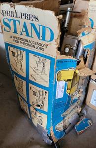 lot 904 image: DRILL PRESS STAND IN BOX AS SHOWN.