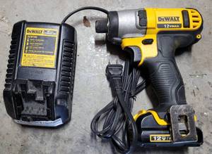 lot 928 image: DEWALT CORDLESS IMPACT DRILL DCF815 WITH BATTERY AND CHARGER DCB100 AS SHOWN.