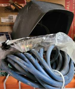 lot 936 image: AIR HOSE, WELDING HELMET, AND WASHER CORD AS SHOWN.