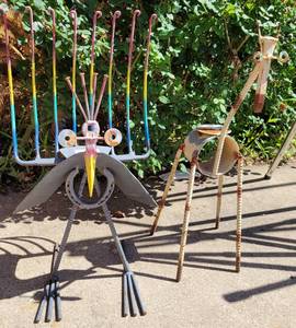 lot 979 image: LOT OF 2 YARD ART INCLUDING CUSTOM MADE PEACOCK MADE BY ARTIST LUIS COLMENARES FROM NEW ORLEANS AS SHOWN. (YOUR BID X 2)