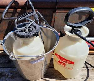 lot 1007 image: STAINLESS STEEL PAIL PLUS 2 SPRAYERS AS SHOWN.