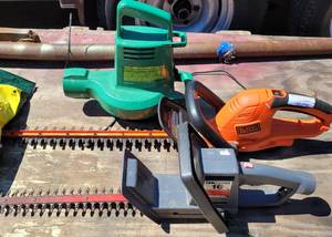 lot 1014 image: HEDGE TRIMMERS AS SHOWN.