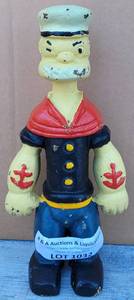 lot 1032 image: VINTAGE CAST IRON POPEYE COIN BANK AS SHOWN. APPROX. 9 HIGH.
