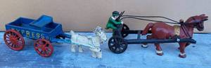 lot 1033 image: LOT OF 2 VINTAGE CAST IRON HORSE WAGONS AS SHOWN. (YOUR BID X 2)