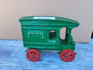 lot 1035 image: VINTAGE MCCALLASTER 1907 CAST IRON TRUCK AS SHOWN. APPROX. 7.5 LONG X 4 WIDE.