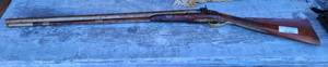 lot 1058 image: VINTAGE DOUBLE BARREL SHOTGUN IN STYLE, COLOR, AND CONDITION SHOWN.