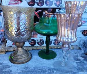 lot 1064 image: LOT OF CANDLE HOLDERS IN VARIOUS STYLES AND COLORS AS SHOWN.
