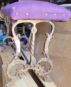 lot 1085 image: VINTAGE HEAVY WROUGHT IRON BASE VANITY STYLE SEAT WITH CUSHIONED SEAT. SEAT IS DETACHED.